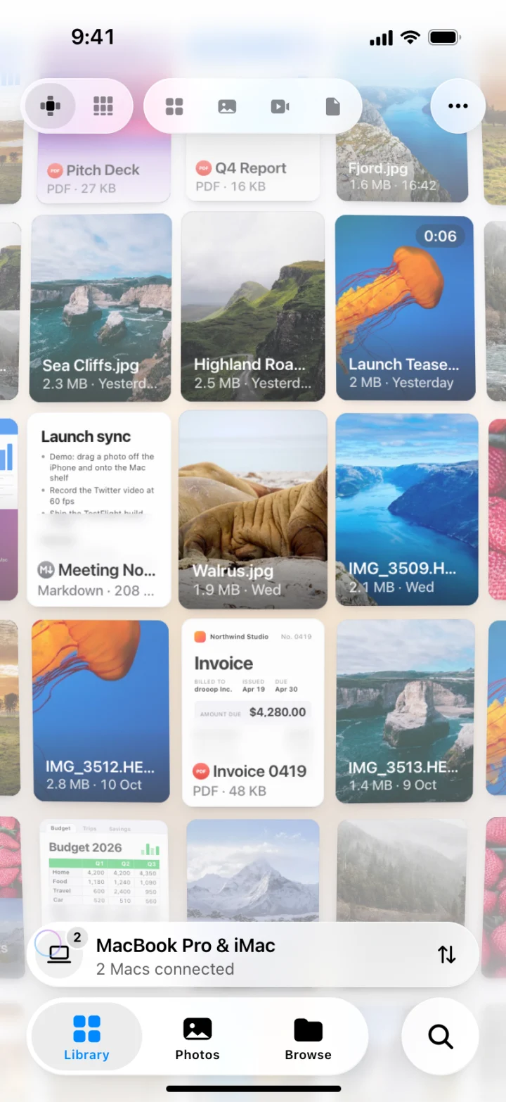 The drooop library on iPhone, with photos and documents in a grid